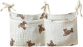 Bedside hanging bag for storing baby milk bottles and blankets by Unknown