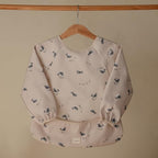 mushie Long Sleeve Baby Bib | Water Resistant Adjustable Fit - Image 3