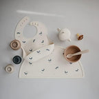 mushie Silicone Baby Bib | Adjustable Fit Waterproof Bibs - Image 2